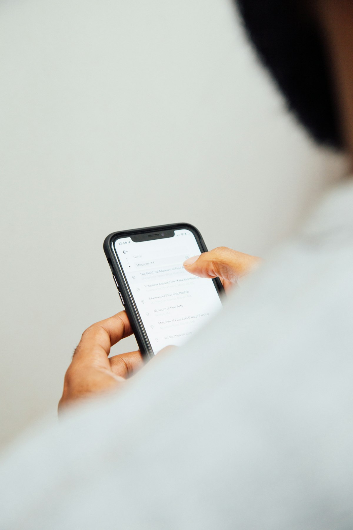 Homeowner reviewing a property report on a smartphone